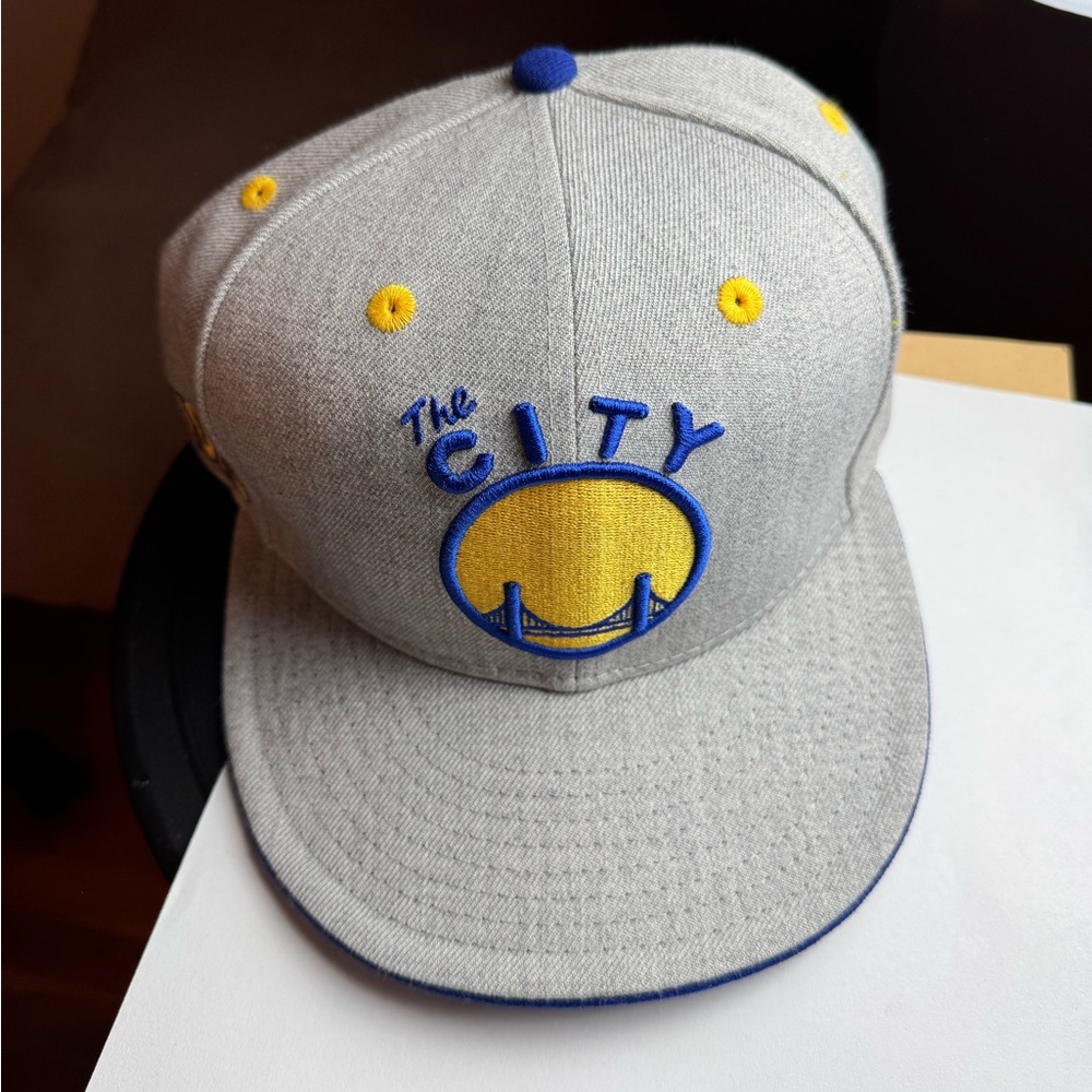 Warriors The City New Era Gray and Blue Cap with Yellow Accents